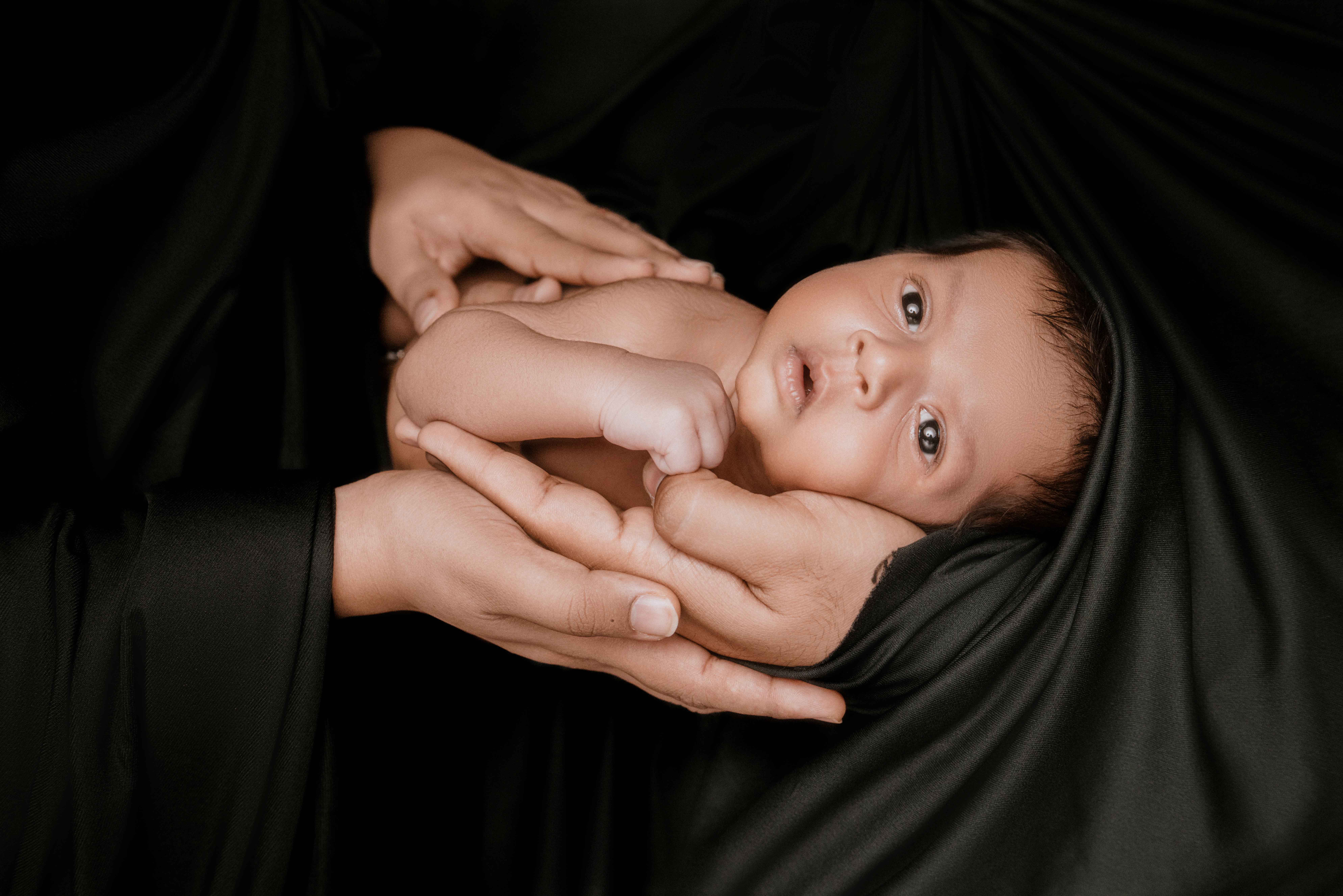 Baby with family portrait